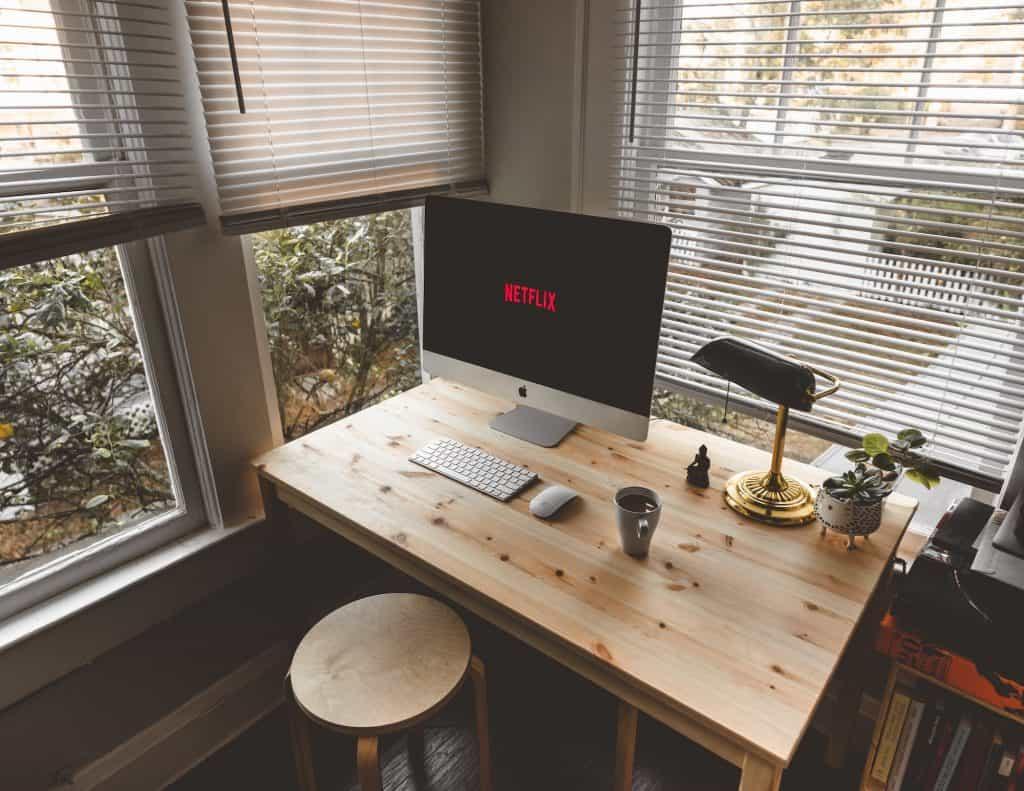 imac with Neflix on screen in home office