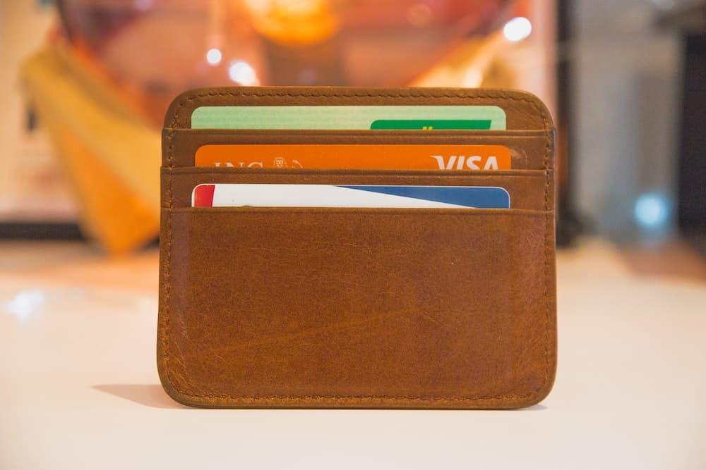 credit cards in brown leather wallet